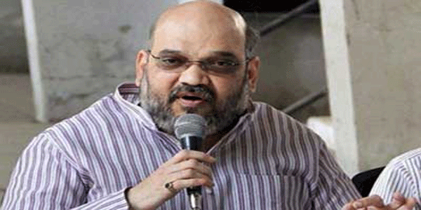 कांग्रेस का नेतृत्व कौन करेगा, राहुल बाबा या मौनी बाबा: अमित शाह